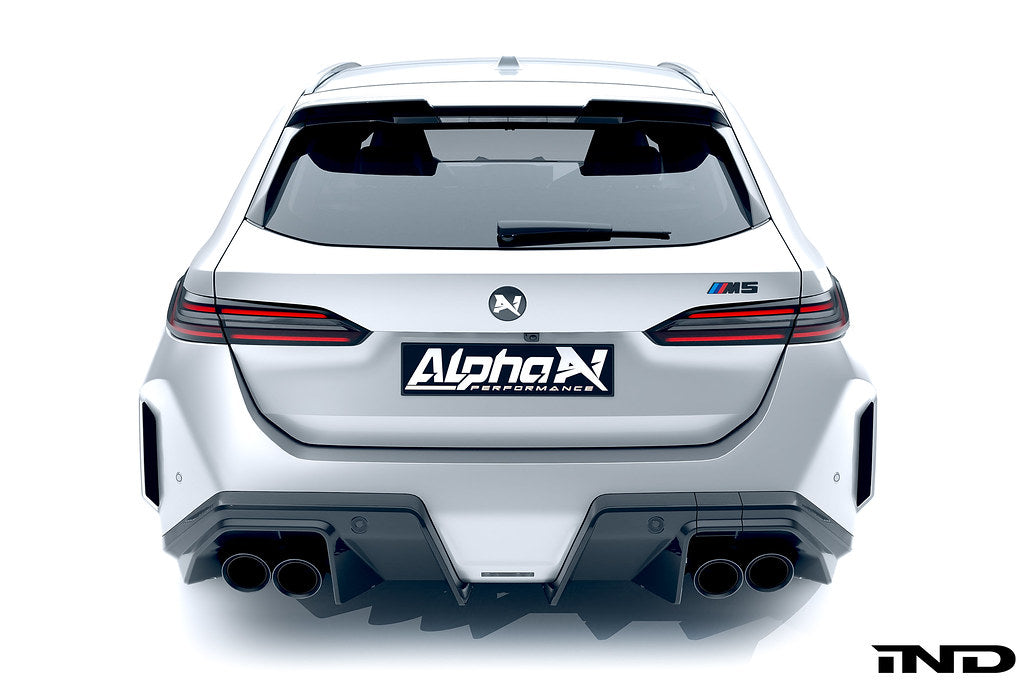 Alpha N G90 G99 M5 carbon rear diffuser installed on vehicle, showcasing sleek exterior design and aerodynamic features.