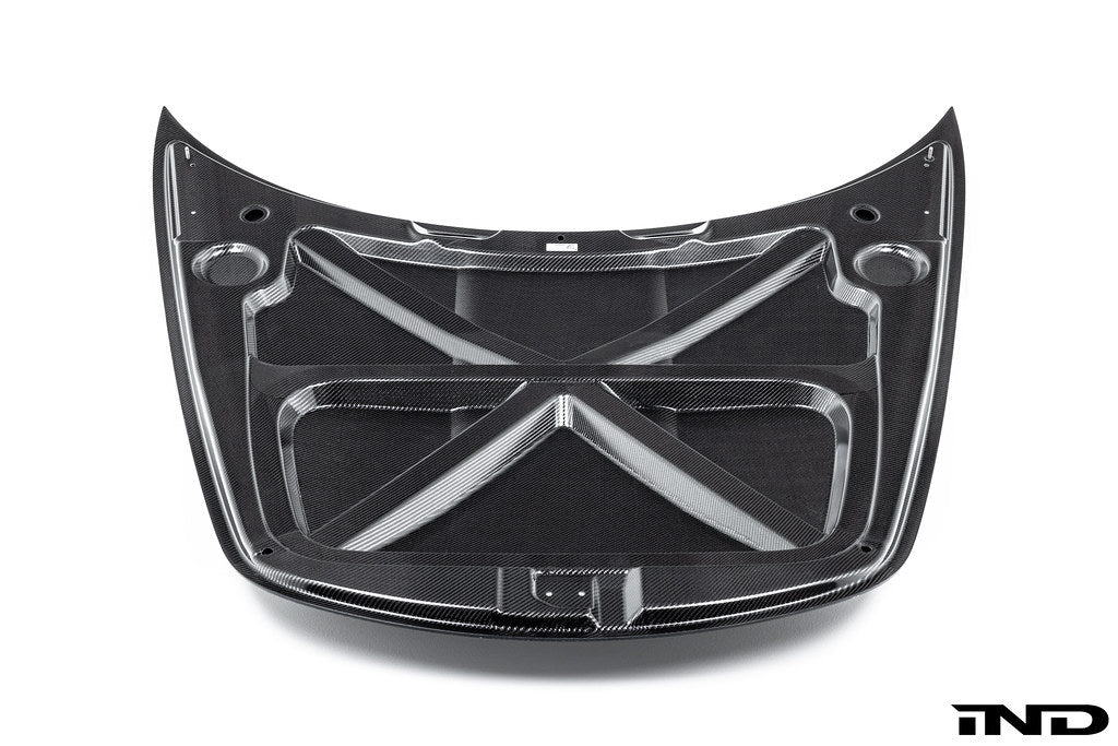 Alpha N carbon hood for Porsche 991, 718, and 981 models, exterior view showcasing lightweight carbon fiber material.