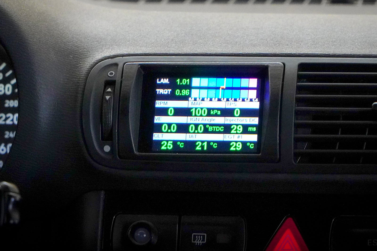 CANchecked MFD32 Gen2 3.2-inch multi-function display installed in a left-hand drive Audi 8L A3 / S3 Pre-Facelift, featuring a vehicle-specific dashboard integration.