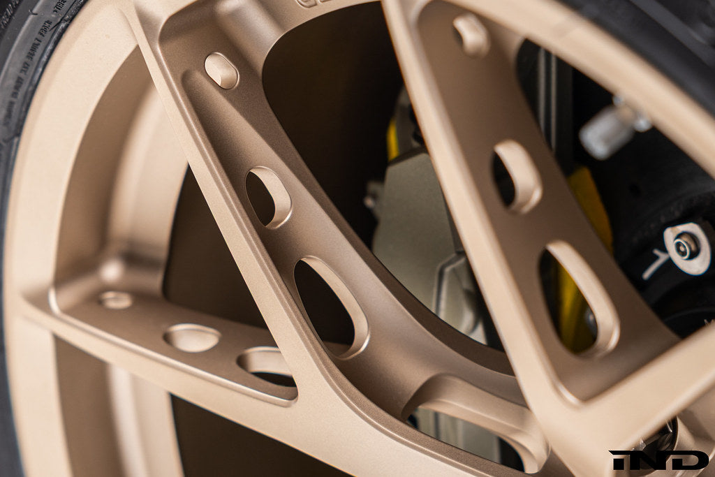 BBS FI-R Evo 19-inch front and 20-inch rear staggered wheel set in Citrine Gold installed on a BMW G87 M2.