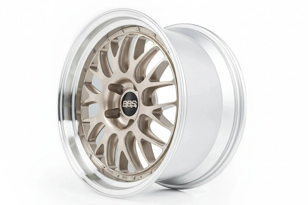 3/4 front view of one of BBS' RT-88 wheels showing a white gold multi-spoke center and Black Bright Diamond-Cut outer rim against a white background.
