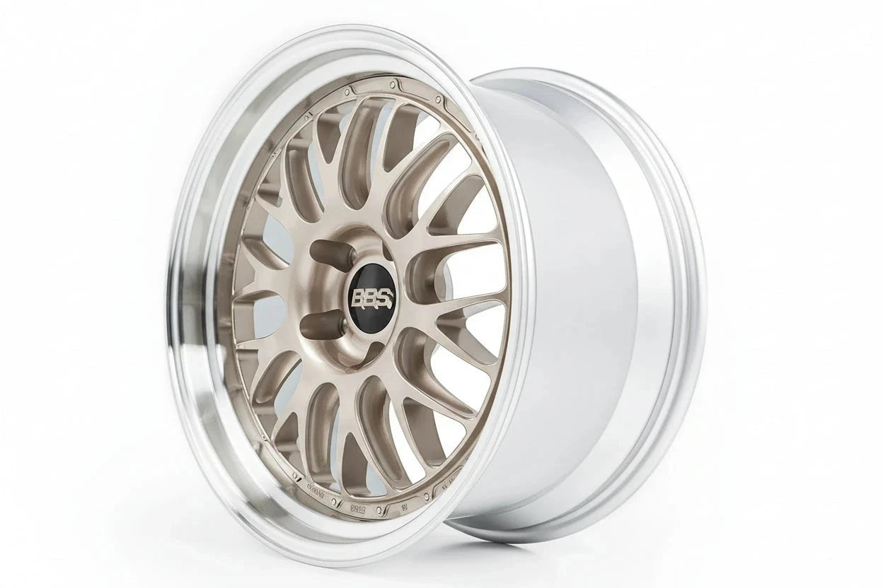 3/4 front view of one of BBS' RT-88 wheels showing a white gold multi-spoke center and Black Bright Diamond-Cut outer rim against a white background.