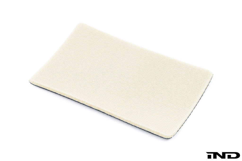 BMW E46 M3 CSL interior center console Alcantara pad showing underside and stitching details.