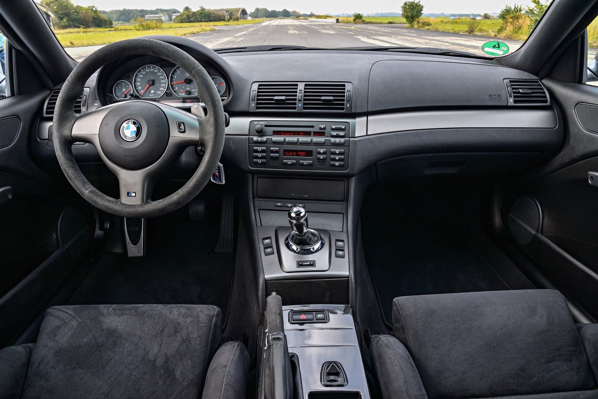 Interior view of the Burkhart Engineering E46 M3 CSL mirror switch relocation harness for BMW E46 M3.
