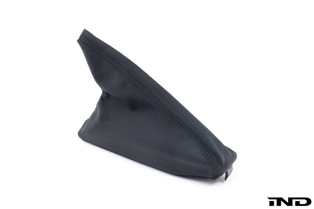 BMW E46 M3 CSL leather e-brake boot for interior upgrade, featuring high-quality black leather and detailed stitching.