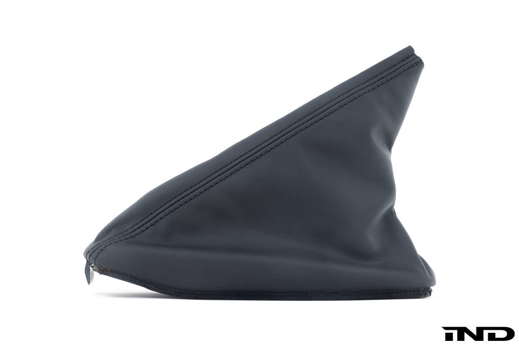 BMW E46 M3 CSL leather interior e-brake boot showing detailed black leather with stitching and mounting hardware.