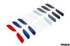 Group photo of the IND Painted Front Reflector Set for the BMW E90, E92, and E93 M3, showcasing 11 OEM BMW color options painted using genuine BMW reflector cores.
