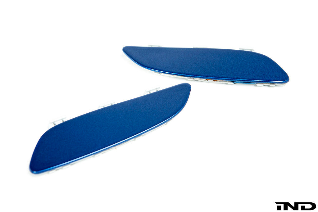 IND Painted Front Reflector Set for the BMW E90, E92, and E93 M3 in Monte Carlo Blue (B05), shown on a white background using genuine BMW reflector cores and OEM paint codes.