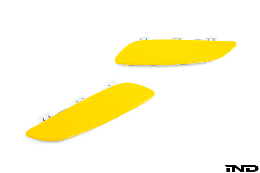 IND Painted Front Reflector Set for the BMW E90, E92, and E93 M3 in Speed Yellow (B06), shown on a white background using genuine BMW reflector cores and OEM paint codes.
