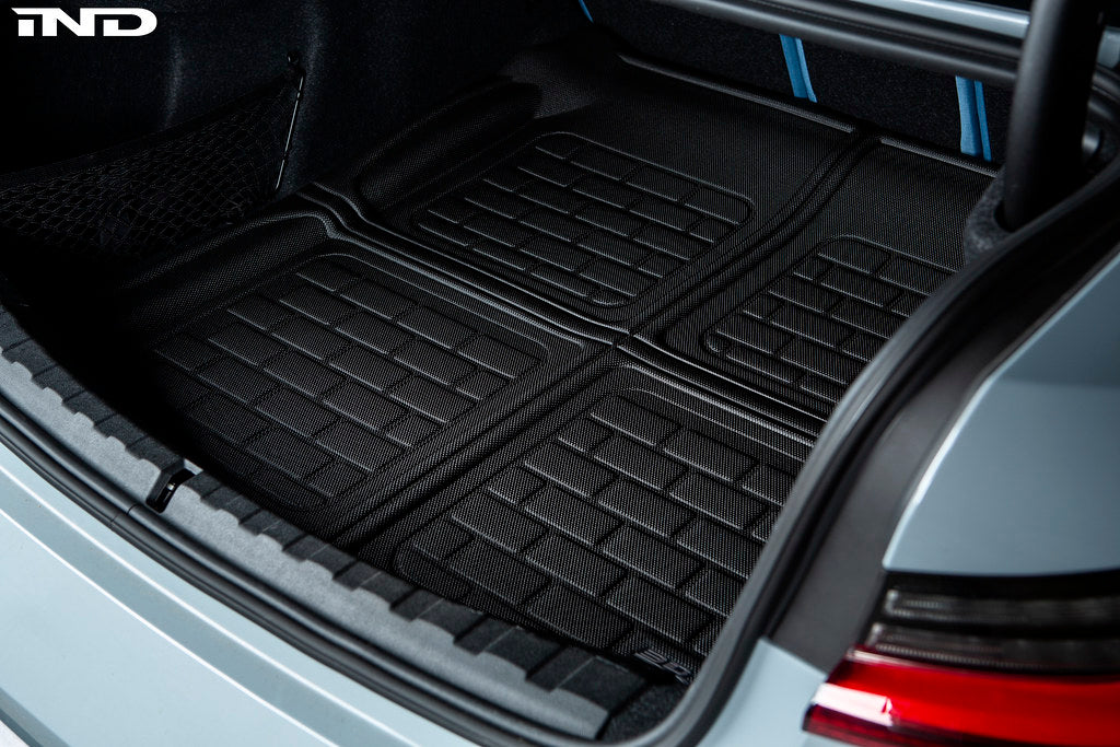 3D MAXpider G80 M3 all-weather cargo mat inside a vehicle, durable rubber with textured surface for trunk protection.