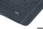 3D MAXpider G80 M3 All-Weather Cargo Mat interior view showing textured rubber surface and raised edges for vehicle cargo protection.