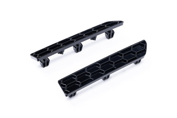 Acexxon BMW G87 M2 rear reflector insert shown on a white background, highlighting the factory-style clips and tabs for direct OEM-style installation.