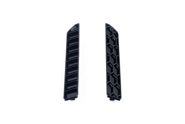 Acexxon BMW G87 M2 Rear Reflector Insert Set shown on a white background, featuring both the honeycomb and horizontal slat gloss black design options.