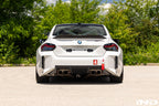 BMW G87 M2 Racing with Acexxon Rear Reflector Insert Set installed, showing the horizontal rear bumper inserts for an OEM+ appearance.