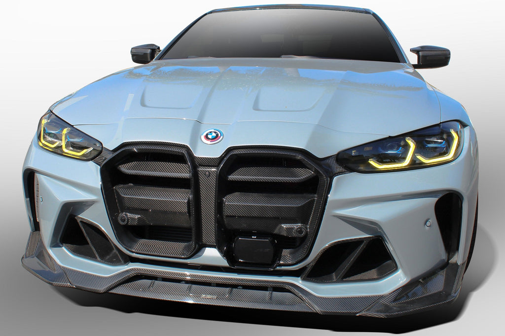 Vorsteiner G8X M3 M4 GTS-V carbon aero front bumper on a BMW G8X M3 M4, showcasing its sleek exterior design and aerodynamic details.