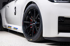 BMW Motorsport G87 M2 Racing black 18x10 wheel set installed on a BMW M2 Racing race car, featuring lightweight motorsport construction, track-focused fitment, and factory BMW Motorsport engineering.