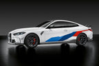 BMW M Performance G8X Style 963M Frozen Gunmetal staggered 19/20-inch wheels on black BMW M4, showcasing sporty wheel design