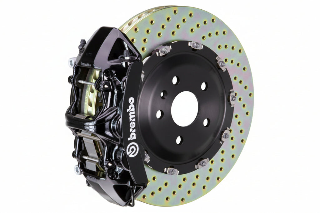 Brembo F85 X5M and F86 X6M GT big brake kit with 405mm drilled front brake rotors and black calipers.