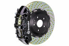 Brembo F85 X5M and F86 X6M GT big brake kit with 405mm drilled front brake rotors and black calipers.