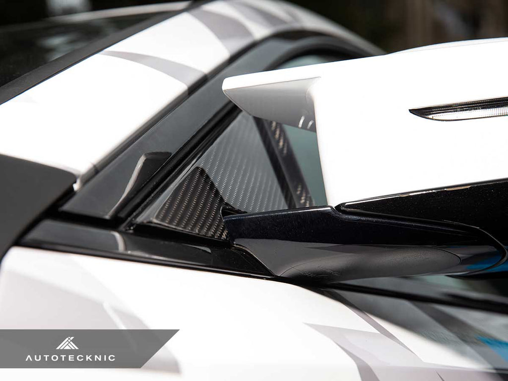 Verus Engineering AutoTecknic G87 M2 dry carbon side mirror wind deflector set installed on a BMW G87 M2 exterior accessory