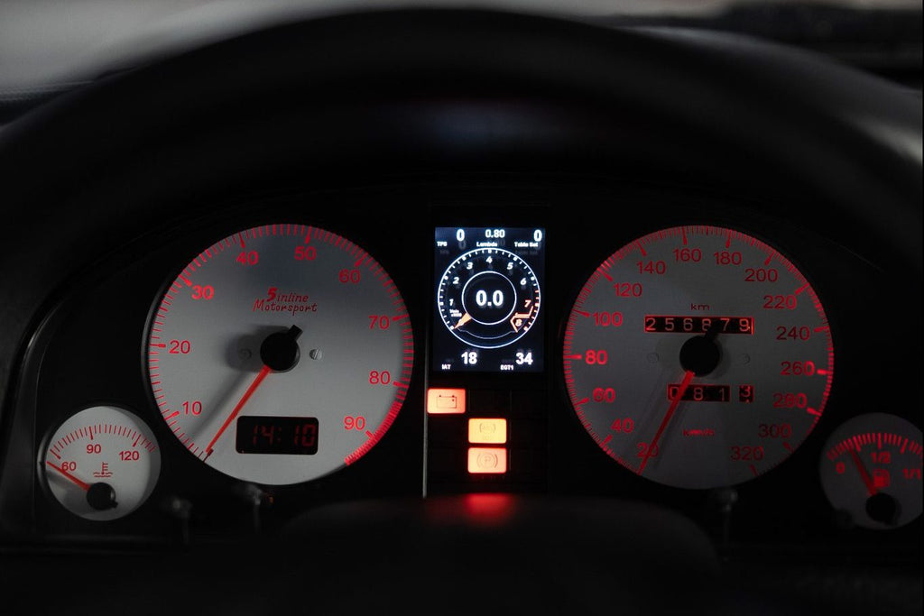 CANchecked MFD28 Gen2 multi function display installed in the cluster of an Audi B4 80 interior displaying live vehicle data and gauges