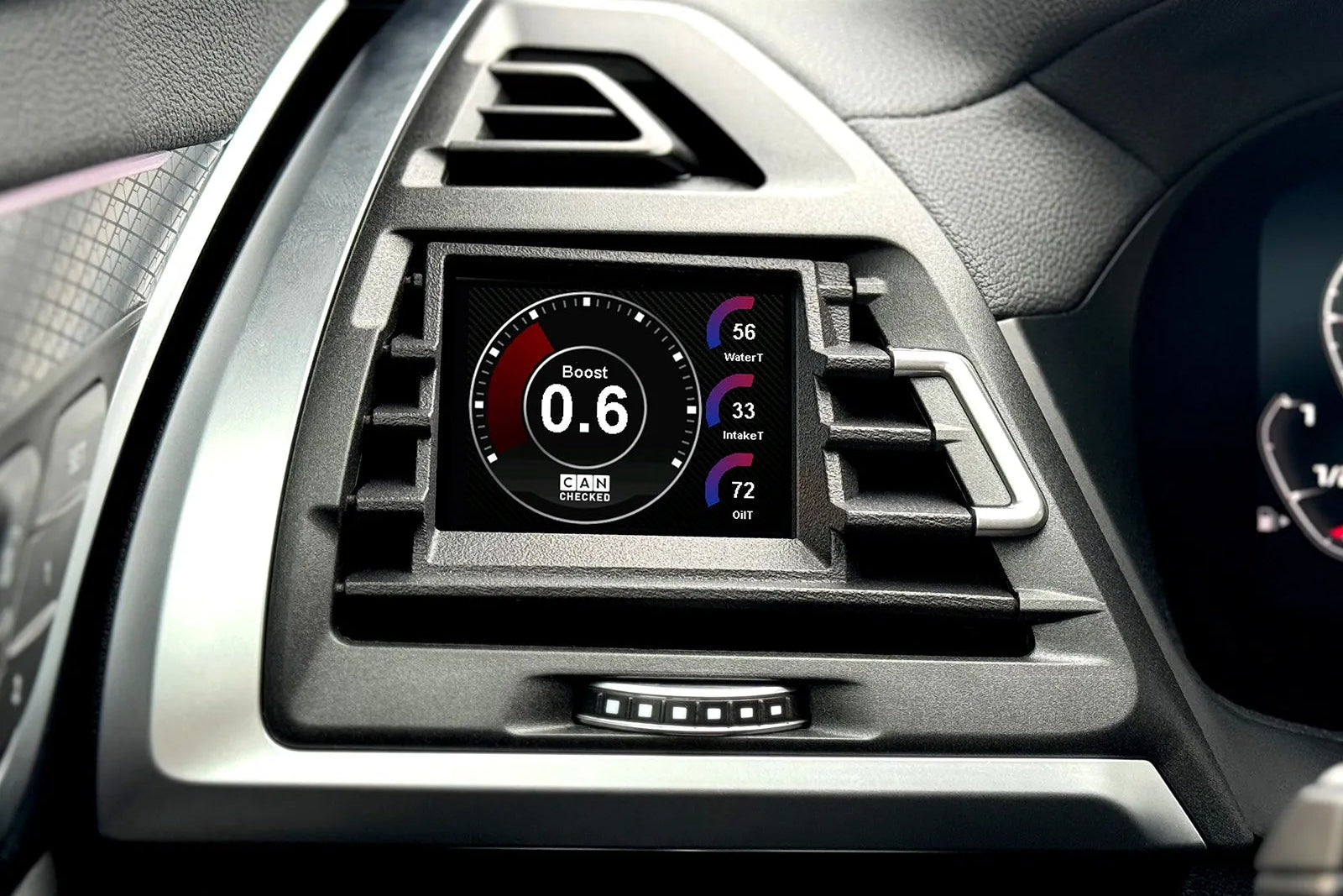CANchecked MFD28 Multi Function Display installed in BMW F97 X3M and F98 X4M Pre-LCI showing real-time vehicle data and performance monitoring