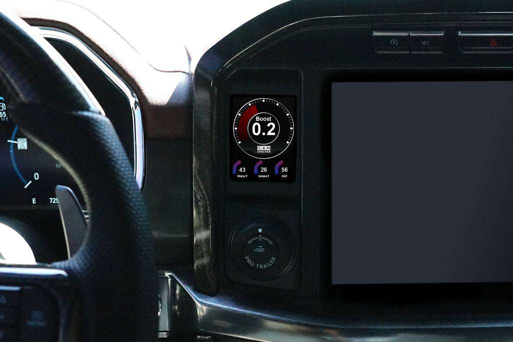 CANchecked MFD32 Gen2 3.2-inch multi-function display installed in a Ford F-150 interior, providing real-time vehicle diagnostics, performance monitoring, touchscreen control, and advanced CAN bus data integration.