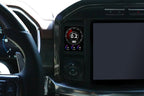 CANchecked MFD32 Gen2 3.2-inch multi-function display installed in a Ford F-150 interior, providing real-time vehicle diagnostics, performance monitoring, touchscreen control, and advanced CAN bus data integration.