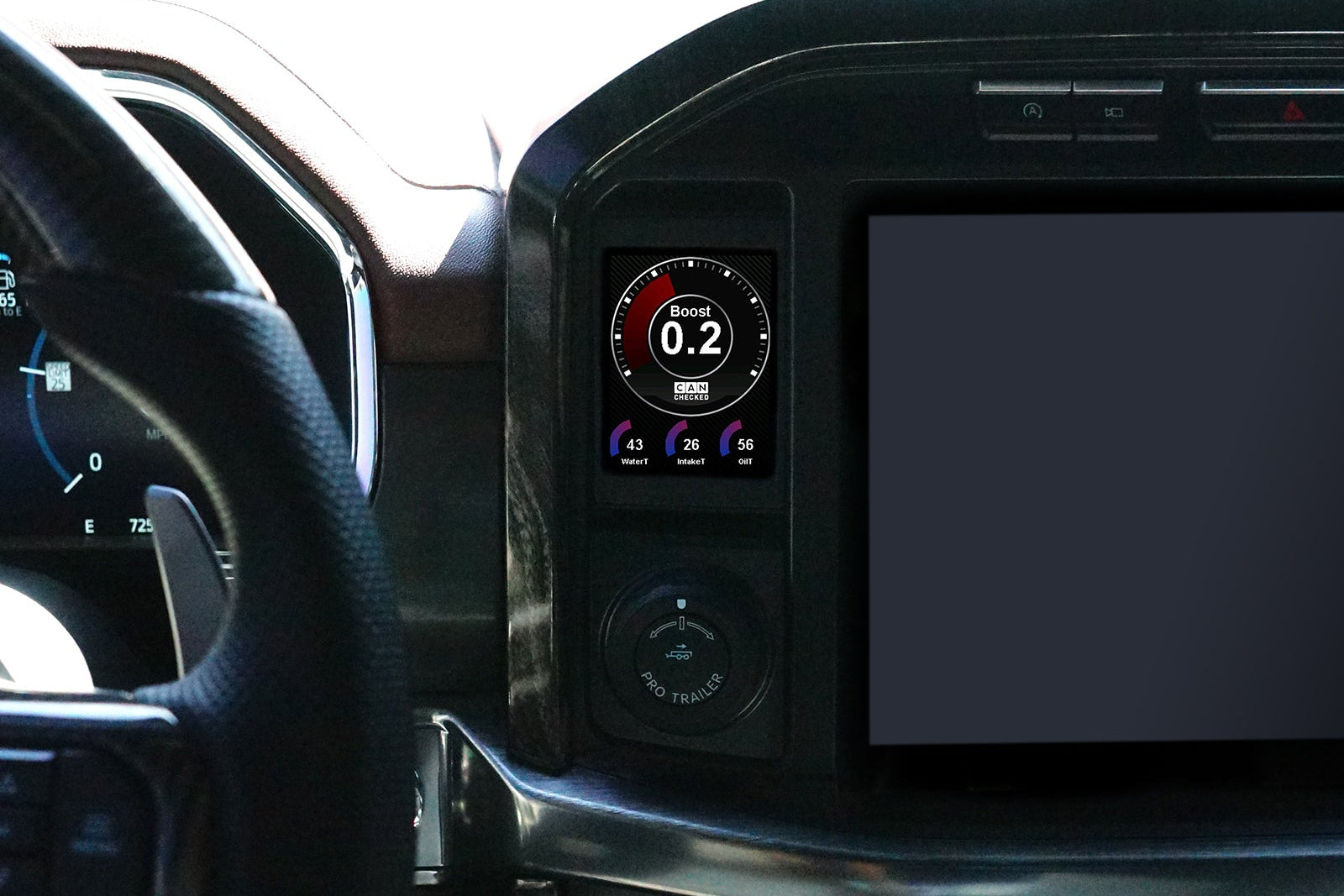 CANchecked MFD32 Gen2 3.2-inch multi-function display installed in a Ford F-150 interior, providing real-time vehicle diagnostics, performance monitoring, touchscreen control, and advanced CAN bus data integration.