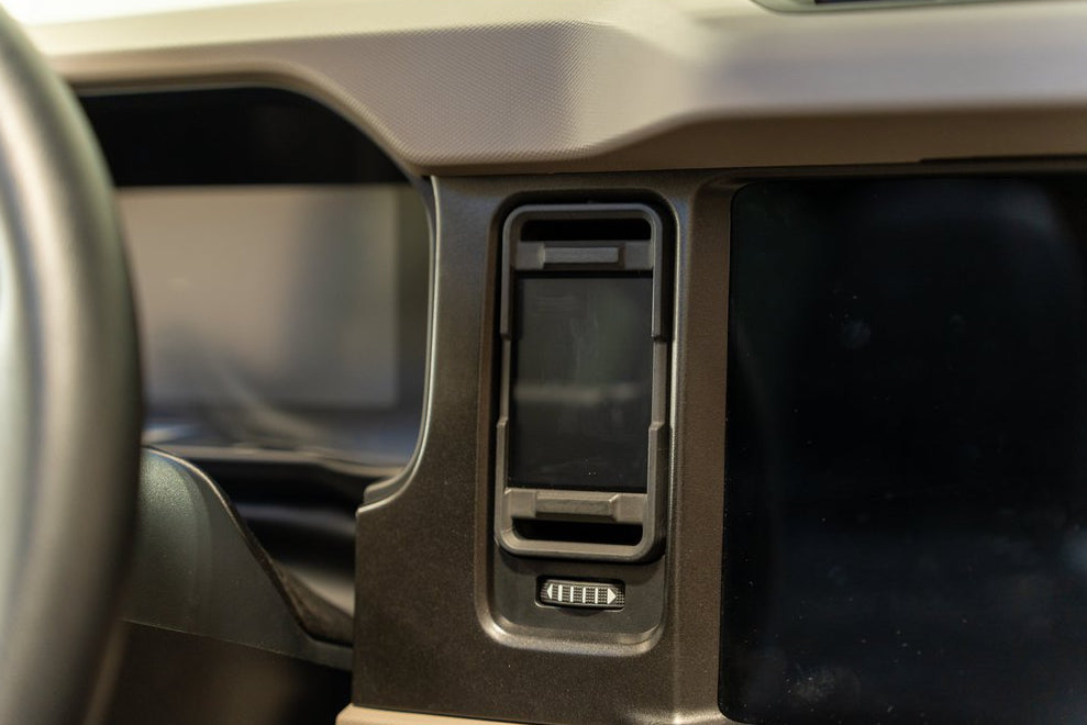 CANchecked MFD32 Gen2 3.2-inch multi-function display installed in the factory dashboard air vent of a Ford U725 Bronco MK6, providing touchscreen control, real-time vehicle diagnostics, performance monitoring, and advanced CAN bus data integration through an OEM-style installation.