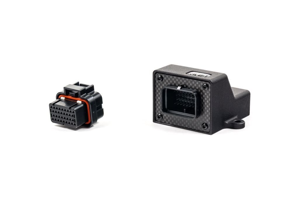 CANchecked MCE18 Multifunction CAN Bus Extension module displayed on a white background, providing CAN bus expansion with analog inputs, digital inputs, digital outputs, frequency inputs, and auxiliary control functions for advanced vehicle integration and data acquisition.