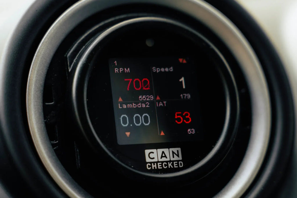 CANchecked MFD15 Gen2 1.5-inch multi-function display installed in a Ford Fiesta MK5, MK6, or MK7 interior, providing real-time vehicle diagnostics, performance monitoring, and customizable data display through a vehicle-specific integration.
