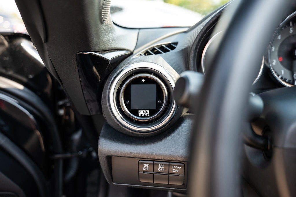 CANchecked MFD15 Gen2 1.5-inch multi-function display installed in a Mazda ND Miata MX-5 interior, providing real-time vehicle data, diagnostics, and performance monitoring through a vehicle-specific integrated display solution.