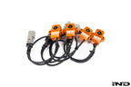 CANchecked TMC04 Tire Temperature Monitoring Set with four infrared tire temperature sensors, cables, and CAN bus connectivity displayed on a white background.