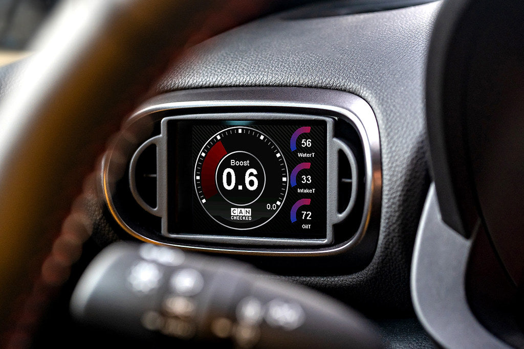 CANchecked MFD32 Gen2 3.2-inch multi-function display installed in a left-hand drive Toyota XP210 Yaris with standalone ECU integration, displaying real-time engine and vehicle data.