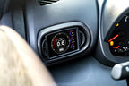 CANchecked MFD32 Gen2 3.2-inch multi-function display installed in a left-hand drive Toyota XP210 Yaris with standalone ECU integration, displaying real-time engine and vehicle data.