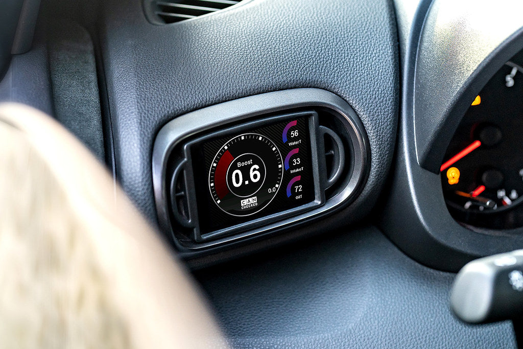 CANchecked MFD32 Gen2 3.2-inch multi-function display installed in a left-hand drive Toyota XP210 Yaris with standalone ECU integration, displaying real-time engine and vehicle data.