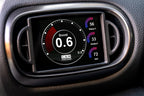 CANchecked MFD32 Gen2 3.2-inch multi-function display installed in a left-hand drive Toyota XP210 Yaris with standalone ECU integration, displaying real-time engine and vehicle data.