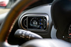CANchecked MFD32 Gen2 3.2-inch multi-function display installed in a left-hand drive Toyota XP210 Yaris Pre-Facelift, displaying real-time engine and vehicle data with OEM-style dashboard fitment.