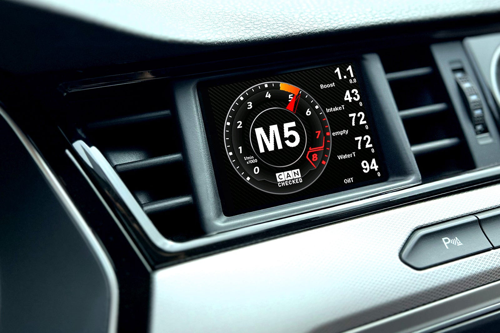 CANchecked MFD32 Gen2 3.2-inch multi-function display installed in a left-hand drive Volkswagen B8 Passat, displaying real-time engine and vehicle data with OEM-style fitment.
