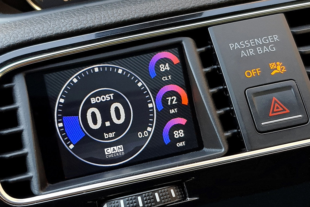 CANchecked MFD28 Gen2 2.8-inch multi-function display installed in a left-hand drive Volkswagen MK3 Scirocco Facelift, displaying real-time engine and vehicle data with OEM-style dashboard fitment.