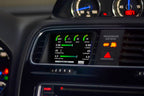 CANchecked MFD28 Gen2 2.8-inch multi-function display installed in a left-hand drive Volkswagen MK3 Scirocco Facelift, displaying real-time engine and vehicle data with OEM-style dashboard fitment.