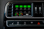 CANchecked MFD32 Gen2 3.2-inch multi-function display installed in a left-hand drive Volkswagen MK5 Polo GTI, displaying real-time engine and vehicle data with OEM-style dashboard fitment.