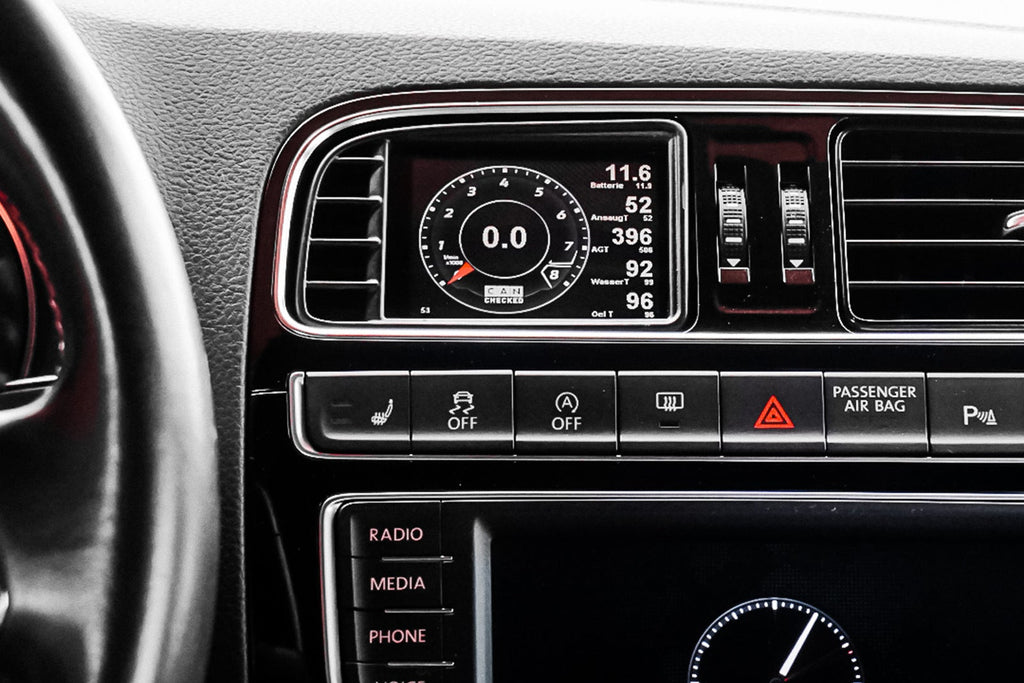 CANchecked MFD32 Gen2 3.2-inch multi-function display installed in a left-hand drive Volkswagen MK5 Polo GTI, displaying real-time engine and vehicle data with OEM-style dashboard fitment.