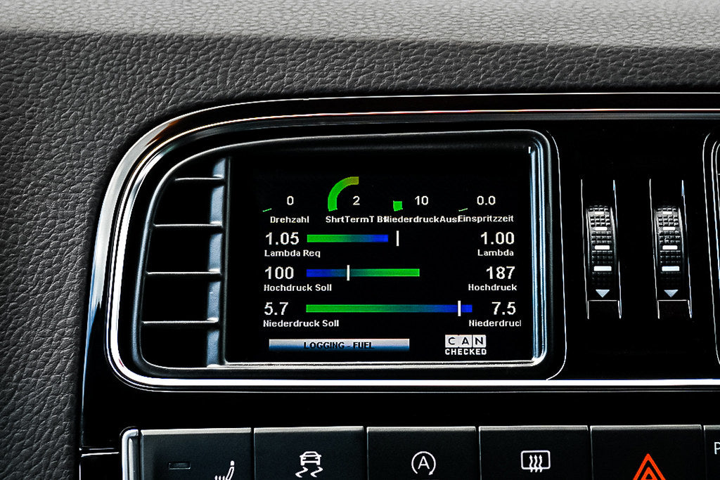 CANchecked MFD32 Gen2 3.2-inch multi-function display installed in a left-hand drive Volkswagen MK5 Polo, displaying real-time engine and vehicle data with OEM-style dashboard fitment.