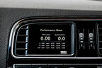 CANchecked MFD32 Gen2 3.2-inch multi-function display installed in a left-hand drive Volkswagen MK5 Polo, displaying real-time engine and vehicle data with OEM-style dashboard fitment.