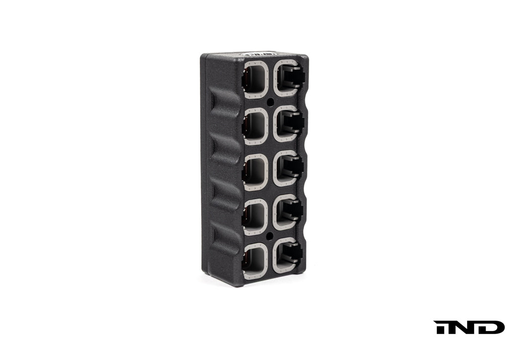CANchecked CBD10 CAN Bus Distribution module for expanding and organizing CAN bus connections in motorsport and performance vehicle applications, shown on a white background.