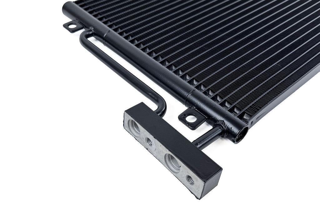 Close-up end tank view of CSF OEM+ Performance A/C Condenser for Porsche 996 911 and 986 Boxster on white background