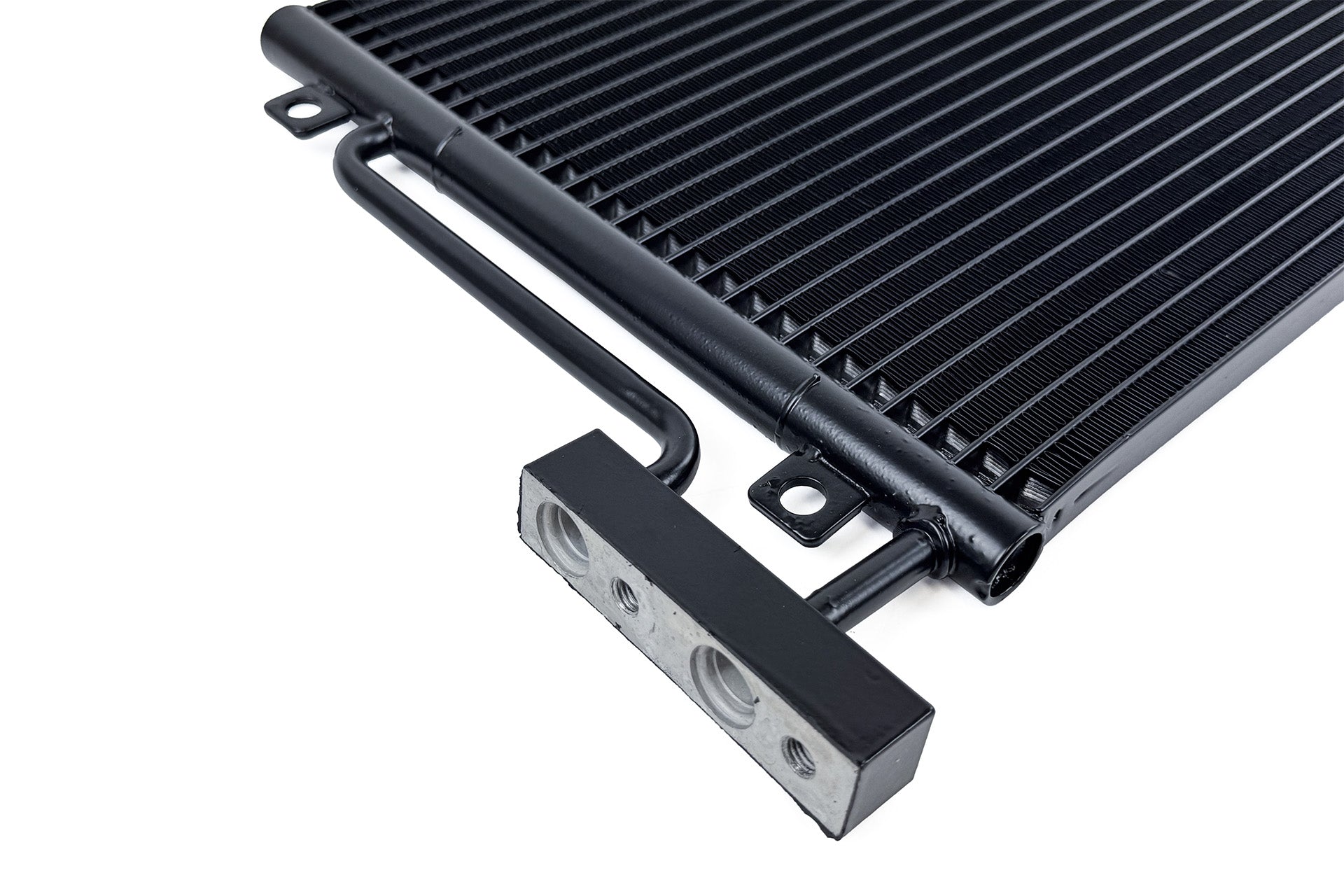 Close-up end tank view of CSF OEM+ Performance A/C Condenser for Porsche 996 911 and 986 Boxster on white background