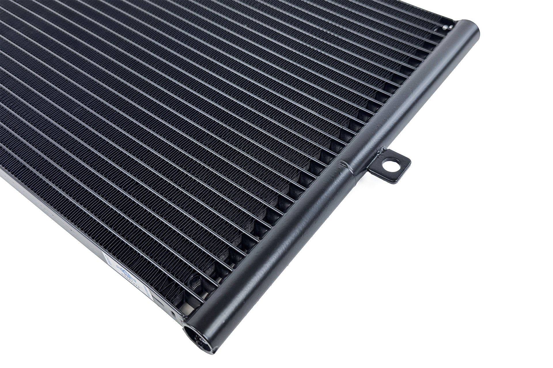 Close-up fin view of CSF OEM+ Performance A/C Condenser for Porsche 996 911 and 986 Boxster on white background